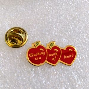 Beautiful teachers lapel pin brooch.